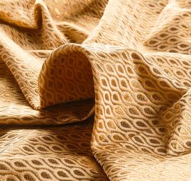 Brokát zlatobéžový jemný geometrický vzor