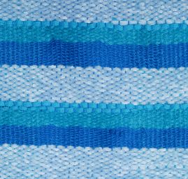 Ručně tkaná látka proužky v modrých barvách