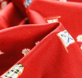 Bavlněná látka vzor praporky/květy červená