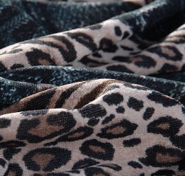 Úplet tisk zvířecí motiv/vlnky tm. zelený