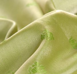 Žakárová látka jemná zelená