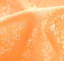 Žakárová látka jemná oranžová