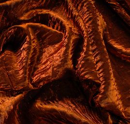 Lamé šatová látka kreš skořicová