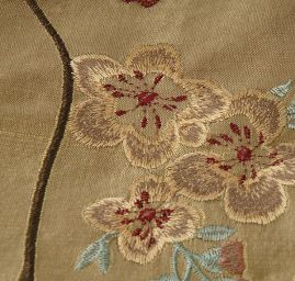 Vyšívaný taft zlatý vzor květy 