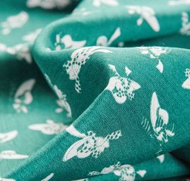 Látka na šaty motiv kloboučků zelená