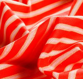 Bavlněná látka s proužky červená