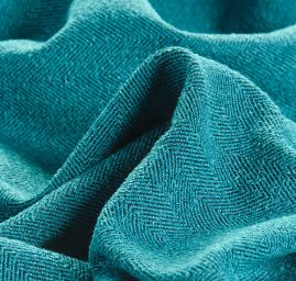 Kostýmová látka Art Fabrics rybí kost tyrkysové barvy