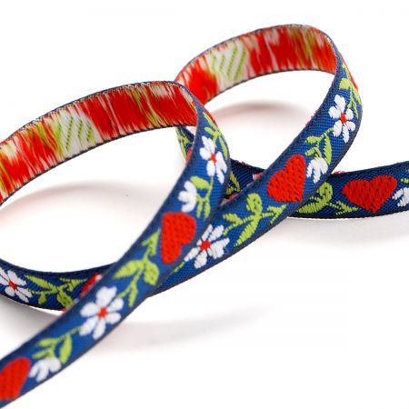 Stuha krojová vyšívaná tm.modrá 9mm