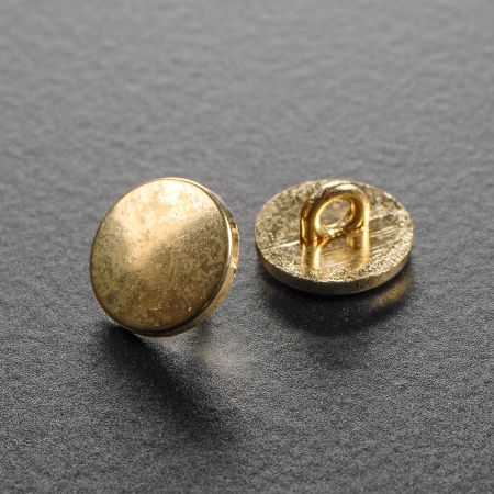 Knoflík kulatý plochý zlaté barvy s krčkem  22"