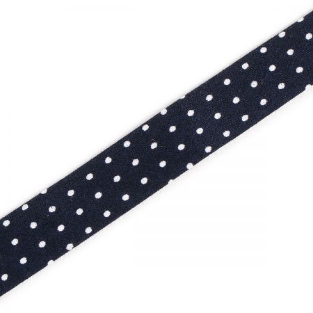 Šikmý proužek bavlna š. 15 mm zažehlený černý puntík