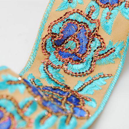 Porta textilní výšivka/flitry květinový vzor tyrkysová