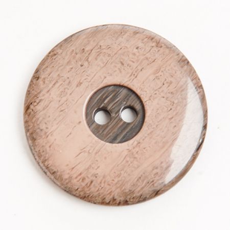 Knoflík plastový dvoudírkový béžový melír