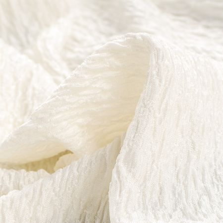 Pletenina s plastickým vzorem kreš slonová kost