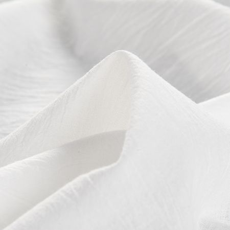 Bavlněná jemná látka kreš lomená bílá