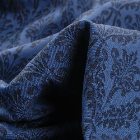 Žakárová látka ornament tm.modrá