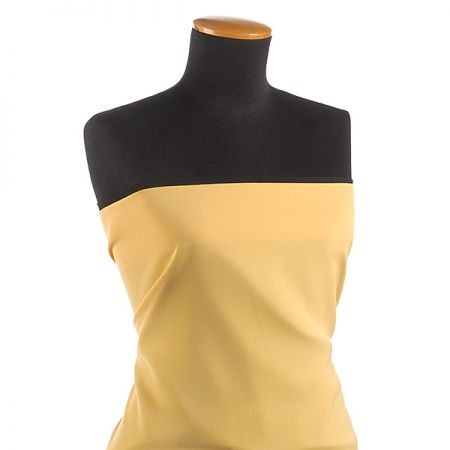 Kostýmová letní látka pastel žlutá