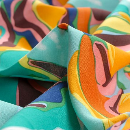 Viskozová šatová látka retro decor oranžová