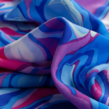 Viskozová šatová látka retro decor modrá