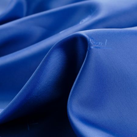 Podšívka žakár písmo nivea modrá