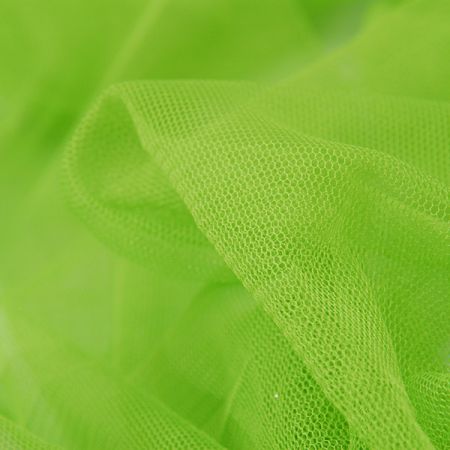 Tyl pružný jemný v jasně světle zelené 