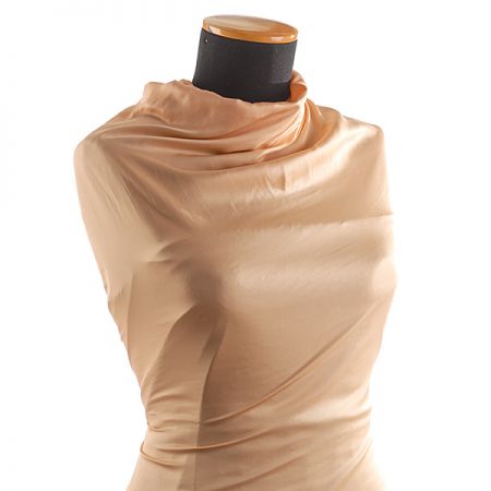 Cupro šatová látka tělové barvy