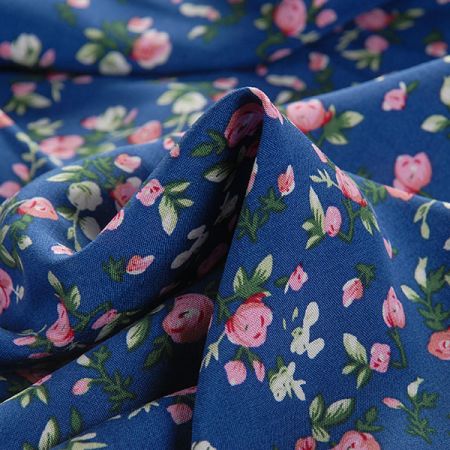 Viskozová šatová látka drobné kytičky modrá