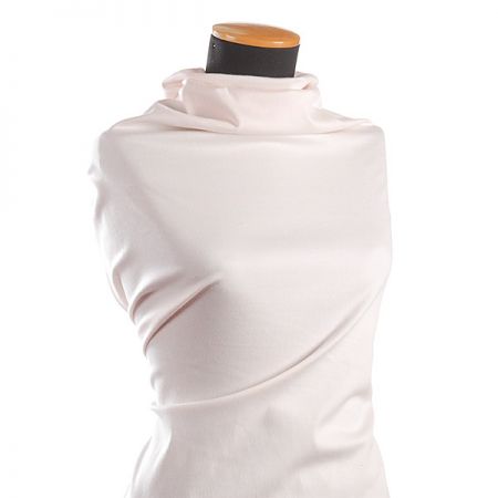 Bavlněná pružná látka smetanová