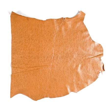 Pravá useň kozina s hrubší kresbou líce hnědá