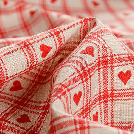 Bavlněná látka tisk motiv kostiček/srdíček červená/režná