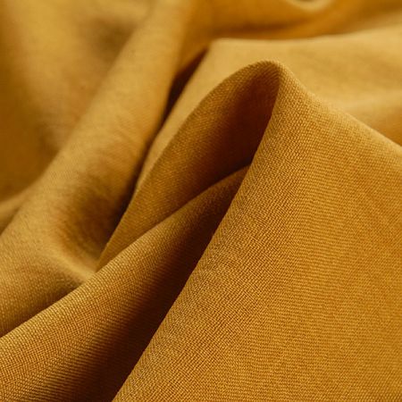 Kostýmová pružná látka imitace lnu okrová