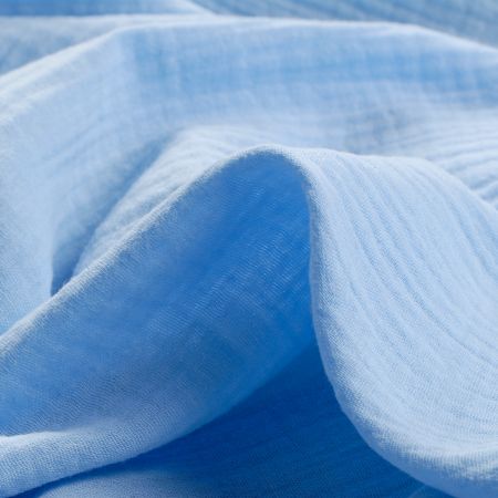 Bavlněný mušelín dvojitá gázovina sv.modrý II.jakost