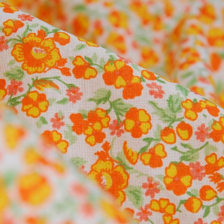 Bavlněná látka tisk kytičkový motiv oranžová