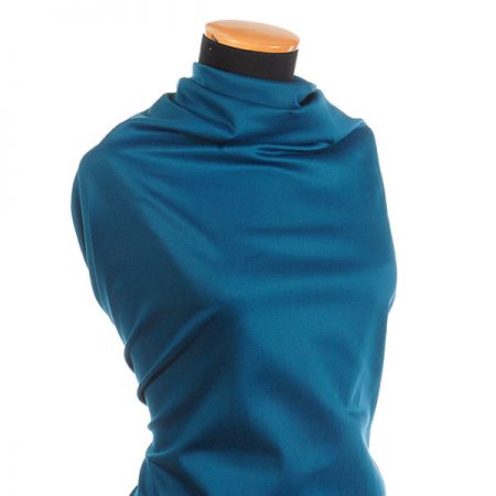 Pružná látka bavlna směs matná tm. tyrkys