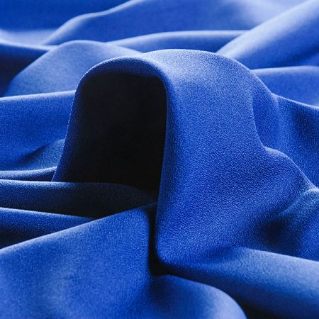 Žoržet šatový oboustranně pružný nivea modrý