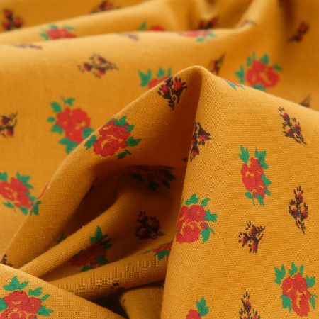 Bavlněná látka drobné květy okrová