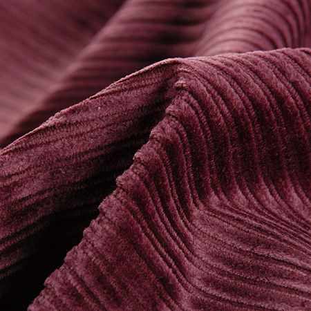 Manšestr nestejně široký proužek tm. vínový