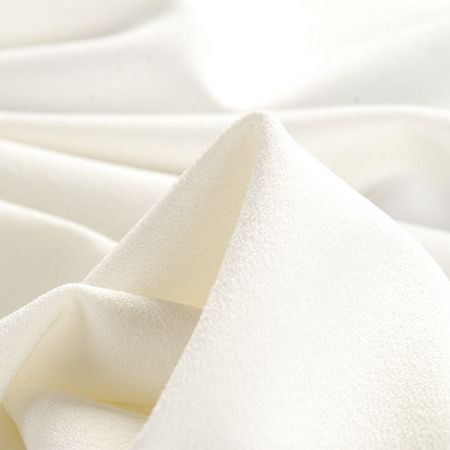 Žoržet šatový silnějsí viskoza směs slonová kost