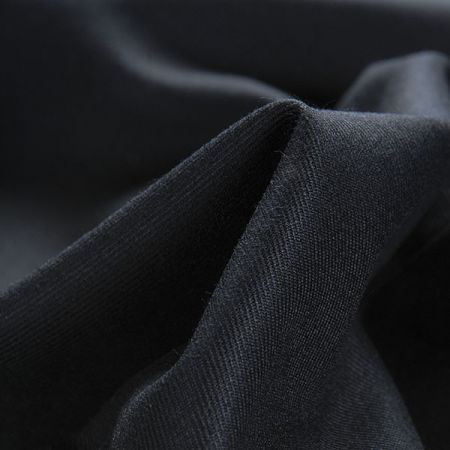 Kostýmová viskozová látka UNI tm.modrá II.jakost