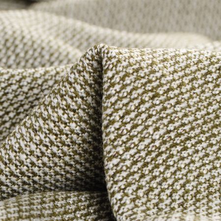 Kostýmová látka zelenobílá s plastickou strukturou