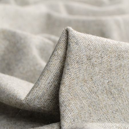 Vlněná kostýmová látka směs zelenokrémová