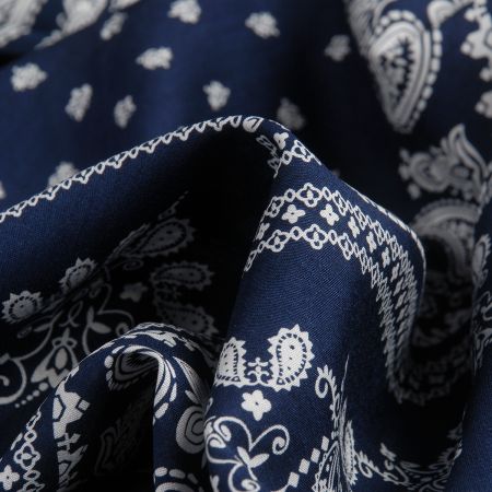 Viskozová šatová látka paisley vzor bílomodrá