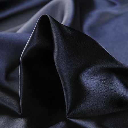 Satén pružný jemný tmavě modré barvy