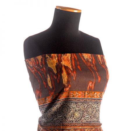 Manšestr pružný jemný s ornamenty hnědooranžový