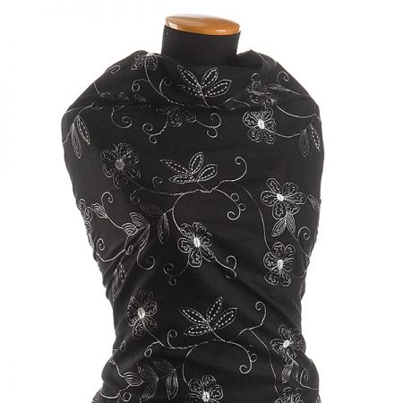 Imitace jelenice černé barvy s výšivkou