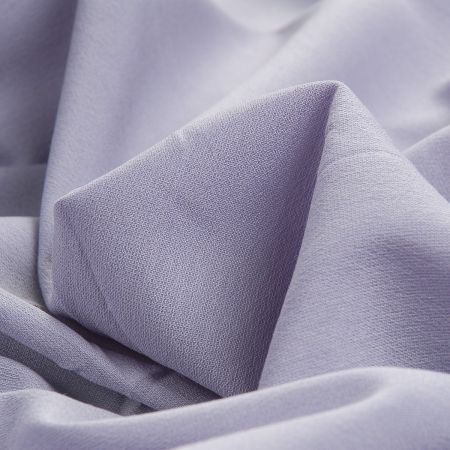 Kostýmová látka viskoza směs světle fialová 