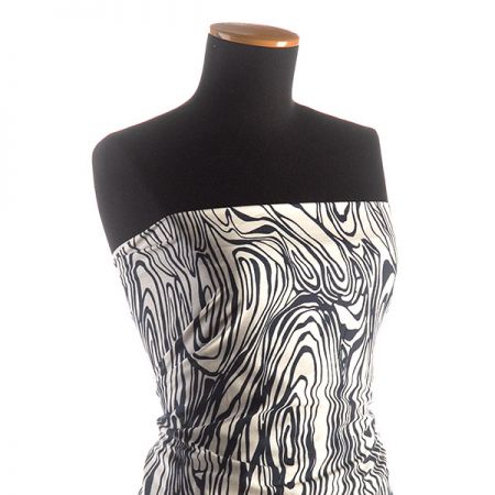 Bavlněná látka na šaty s abstraktním motivem