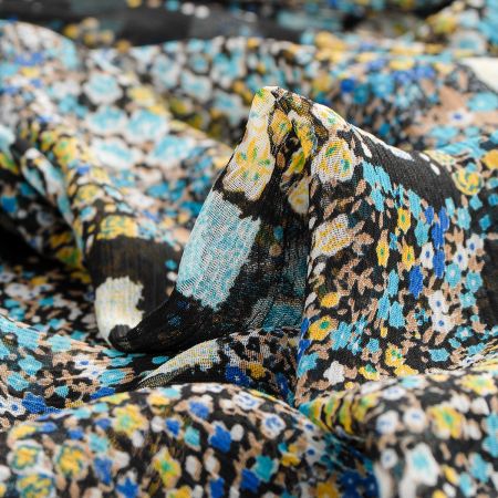 Jemný pružný šifon motiv patchwork petrol