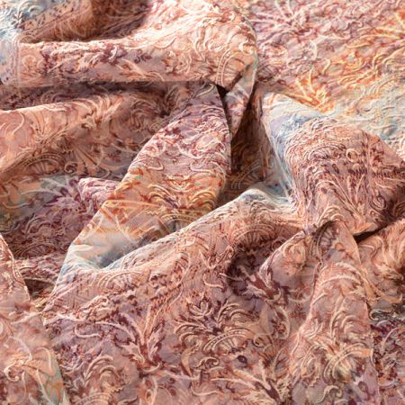 Efektní látka s plastickým vzorem hlavic