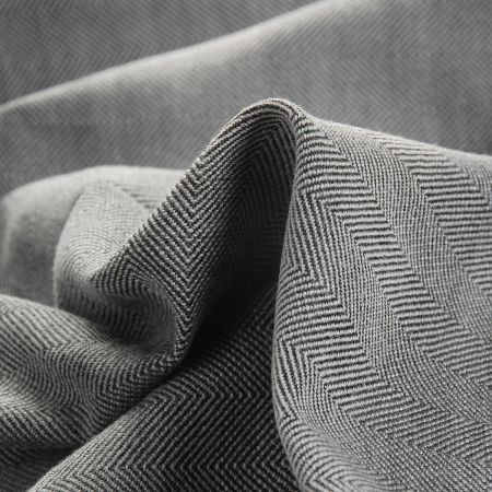 Kostýmová látka Art Fabrics rybí kost šedý melír