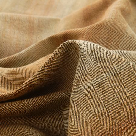 Kostýmová látka Art Fabrics rybí kost žlutohnědý melír